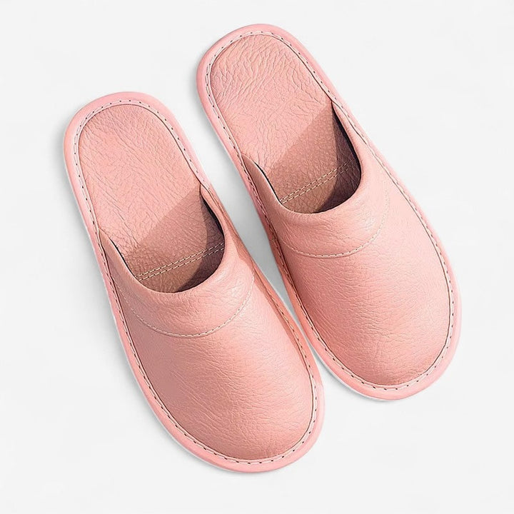 Ciabatte comode unisex, perfette per il relax a casa. Supporto plantare per un benessere duraturo.