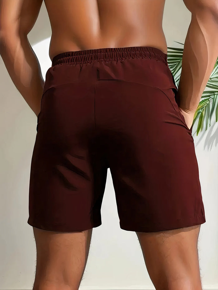 Pantaloncini sportivi per uomo, perfetti per allenamento e corsa. Asciugatura rapida e comfort elevato.