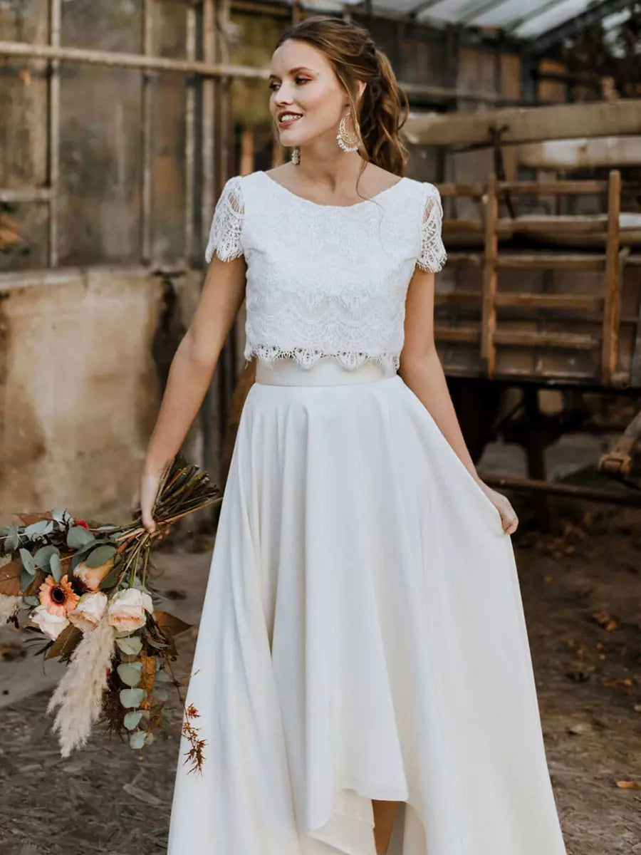 Elegante maxi abito da donna spezzato, ideale per cerimonie. Stile raffinato per un look da invitata impeccabile.