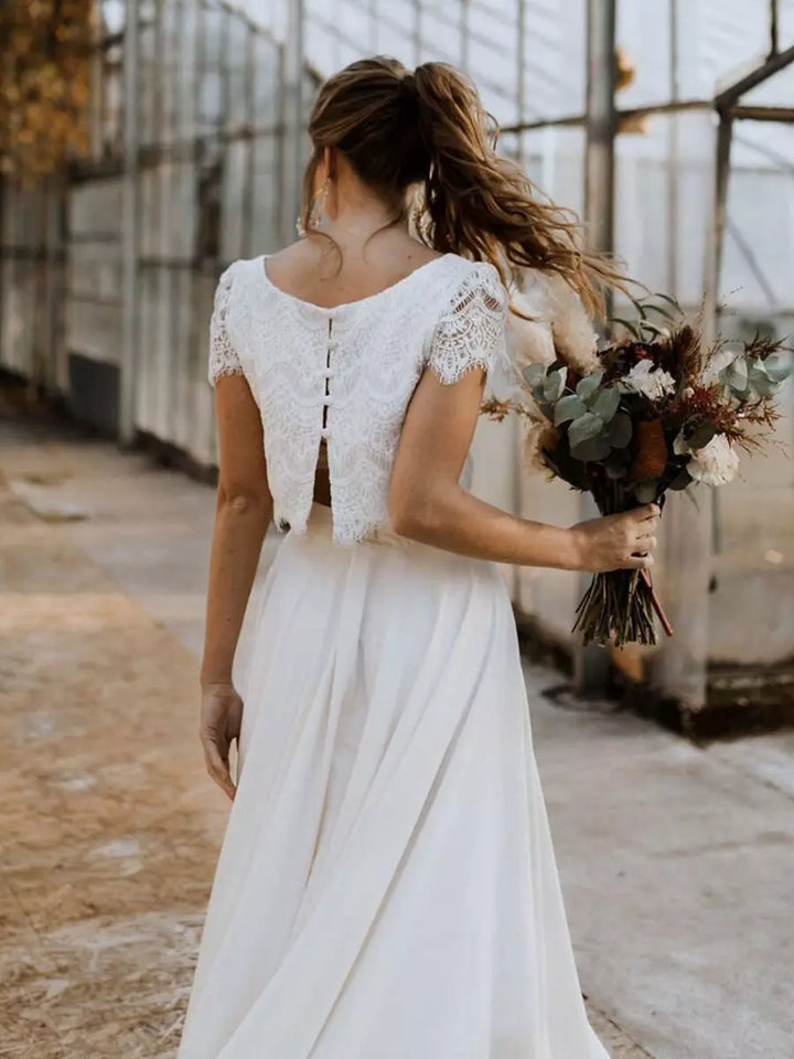 Maxi abito da cerimonia donna, spezzato in stile raffinato. Ideale per un'eleganza estiva e occasioni speciali.