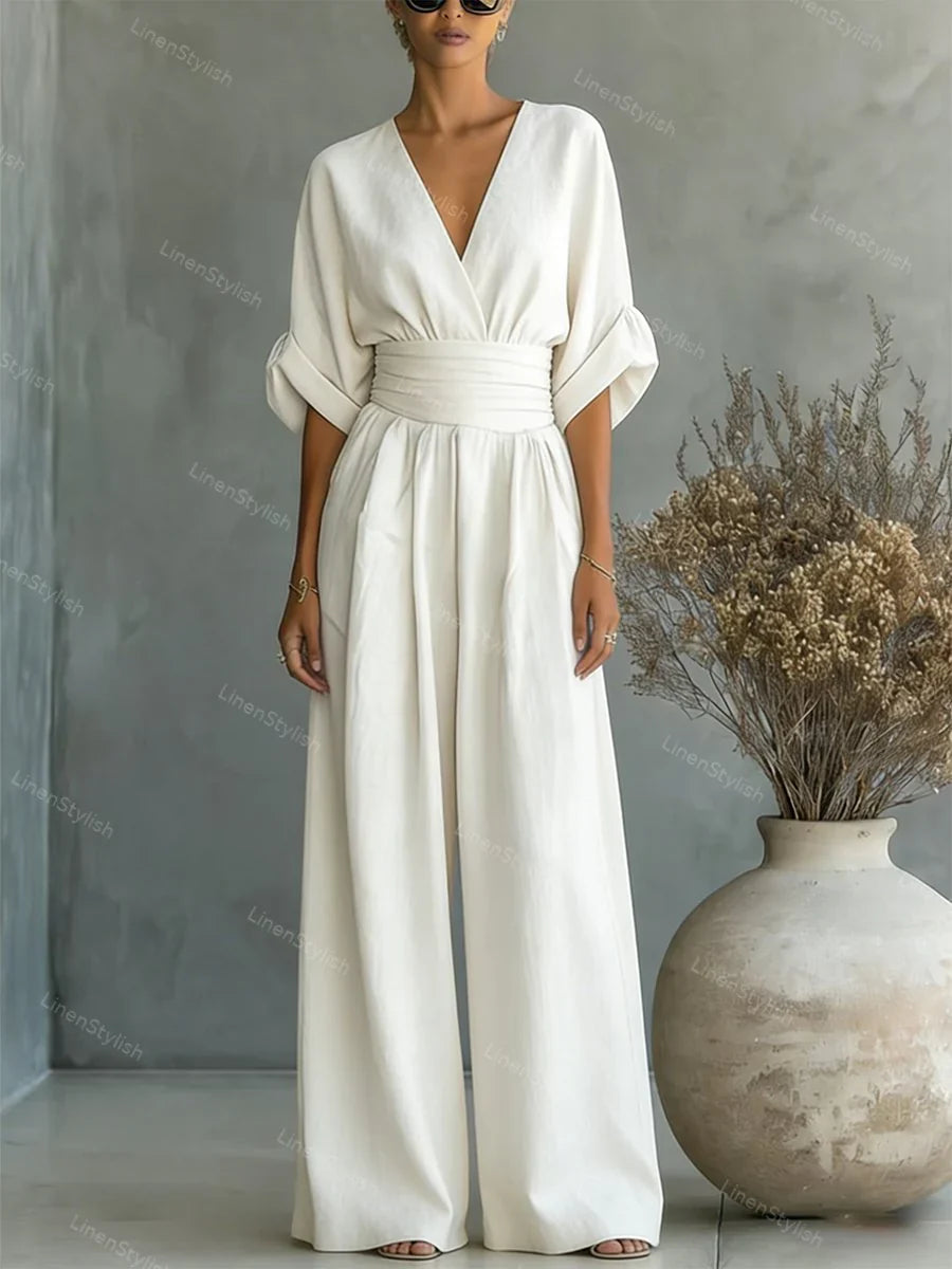 Salopette donna elegante scollo V, maniche kimono, gamba larga e cintura. Perfetta per cerimonie.