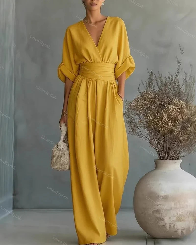 Salopette elegante donna, scollo a V, maniche kimono e gamba ampia per massima libertà di movimento.