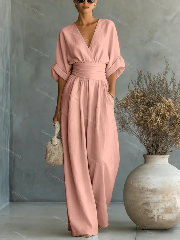 Salopette versatile donna, con cintura e maniche kimono. Un tocco di classe per il tuo guardaroba.