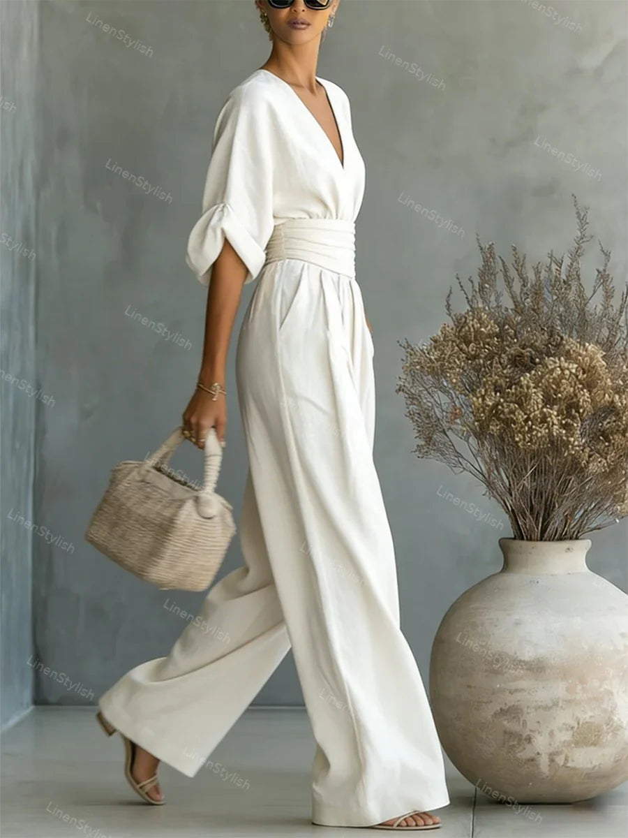 Outfit serale donna chic: salopette con gamba larga e maniche kimono. Stile e comfort assicurati.
