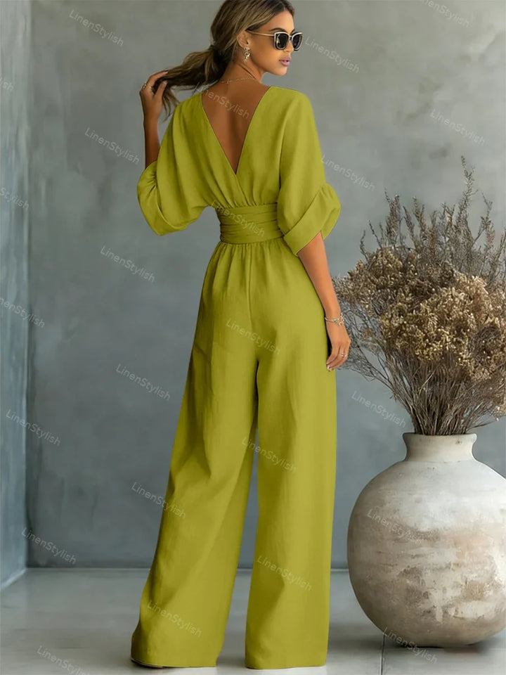 Salopette fluida donna, scollo a V ampio, maniche kimono. Comfort e stile per ogni evento elegante.