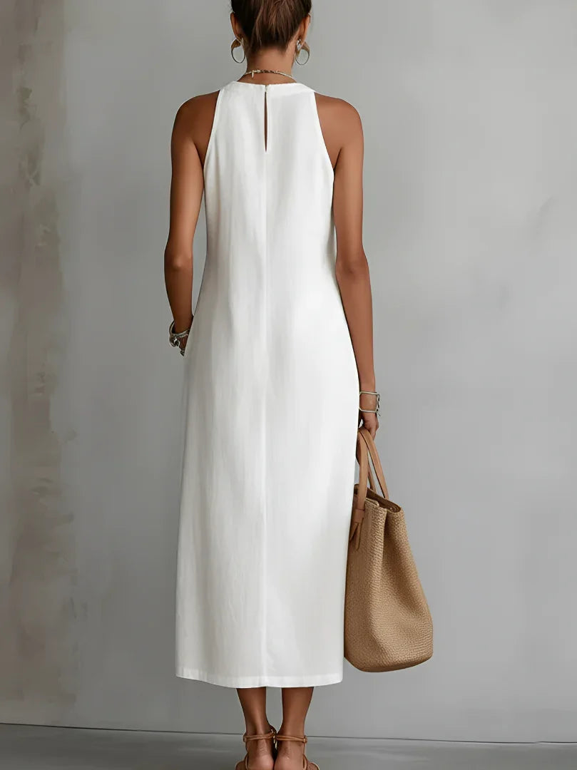 Vestito estivo midi donna con delicato pizzo, senza maniche e spacchi laterali. Fresco e alla moda.