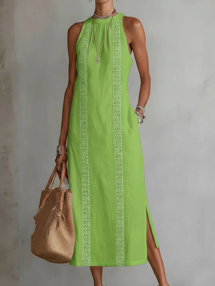Moda donna: Vestito midi chic con dettagli in pizzo, senza maniche e spacchi. Stile elegante e moderno.