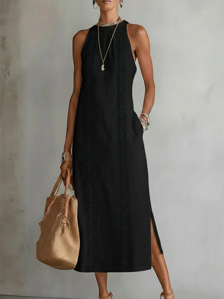 Abito midi donna estivo, leggero e senza maniche, con pizzo e spacchi per un look confortevole.