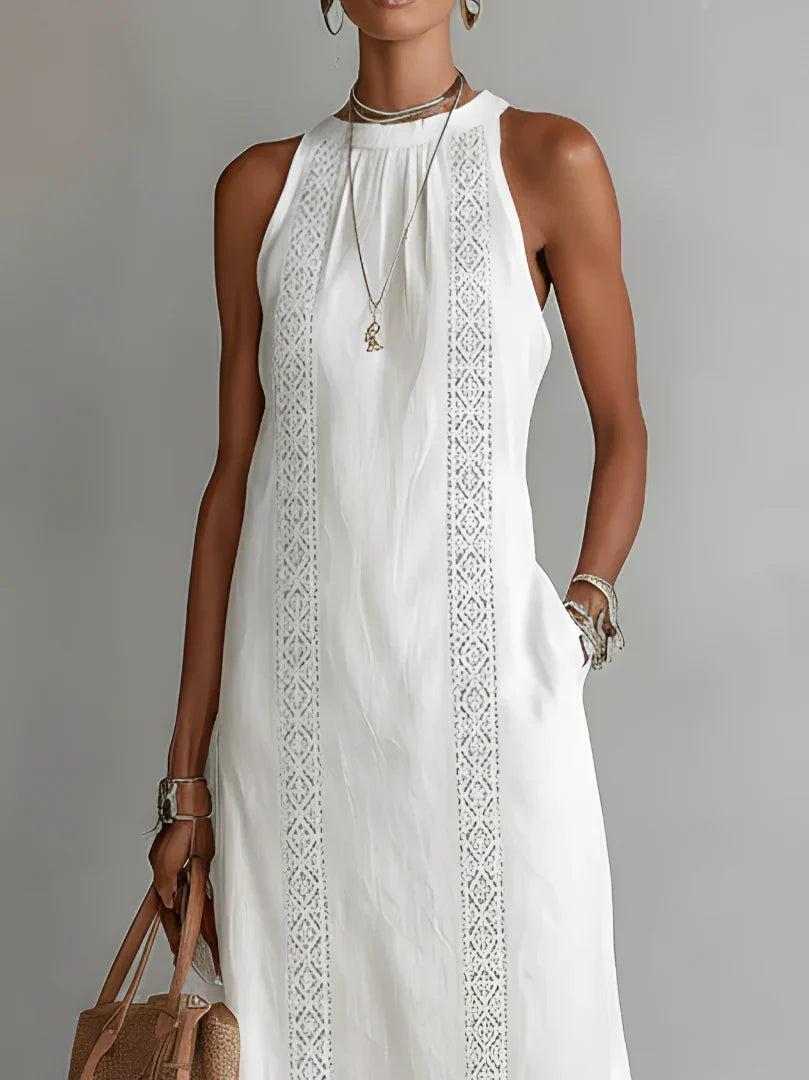 Vestito midi donna da sera in pizzo, senza maniche, con seducenti spacchi. Eleganza estiva irresistibile.