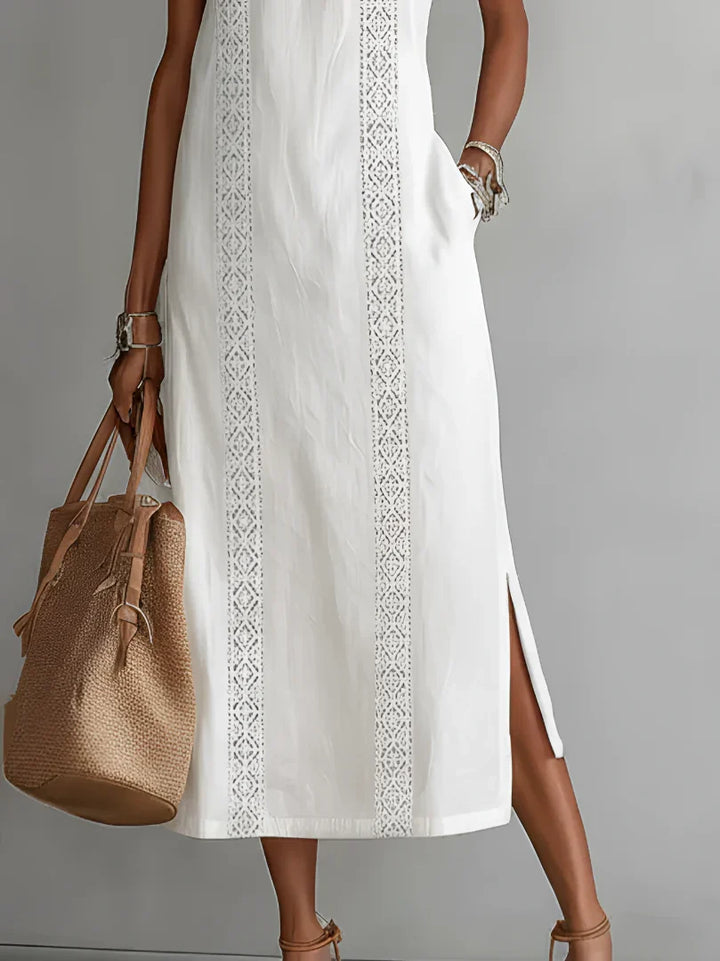Vestito midi casual da giorno, senza maniche, con pizzo e spacchi laterali. Stile comodo e chic.