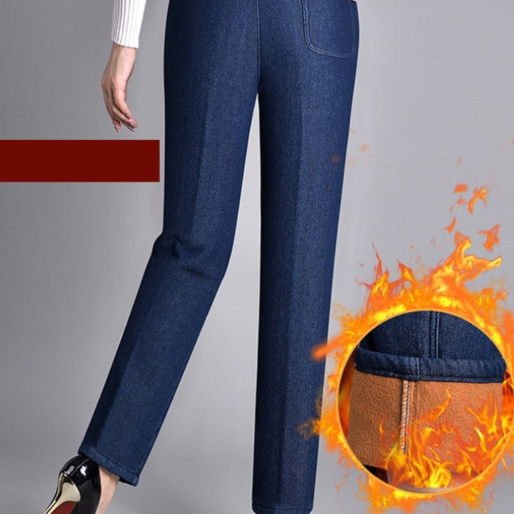 Dettaglio: jeans dritti blu donna, vita alta elastica, tasche frontali. Perfetti per outfit comodi ed eleganti.