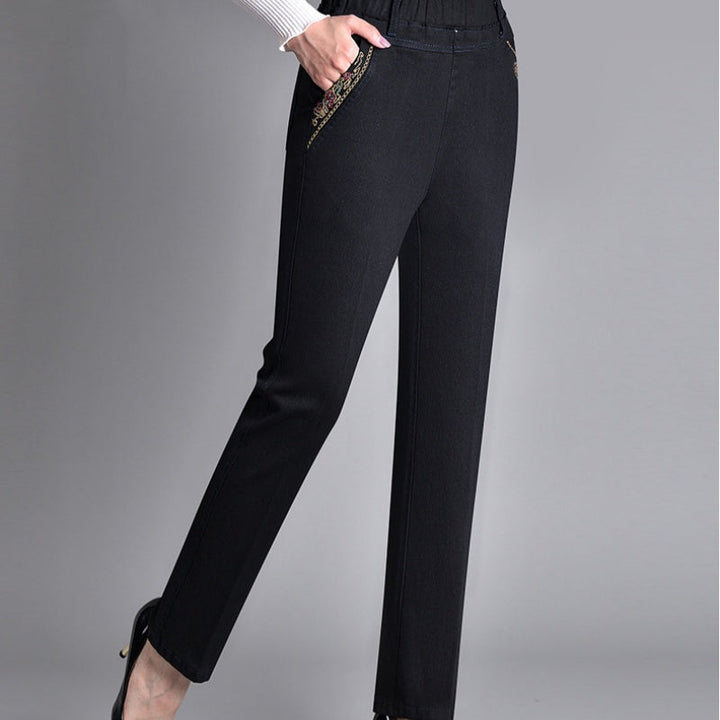 Jeans eleganti neri da donna, a gamba dritta con vita elastica per comfort e un tocco di raffinatezza.