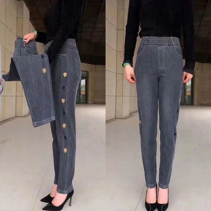 Pantaloni donna a vestibilità aderente, ultra elastici, con stampa a cuori. Vita alta per il massimo comfort e stile.