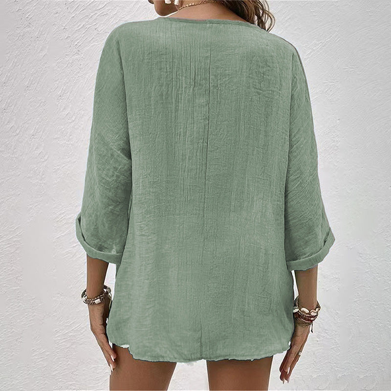 Camicia donna scollo a V, maniche lunghe. Top elegante ma casual, ideale per l'eleganza quotidiana femminile.