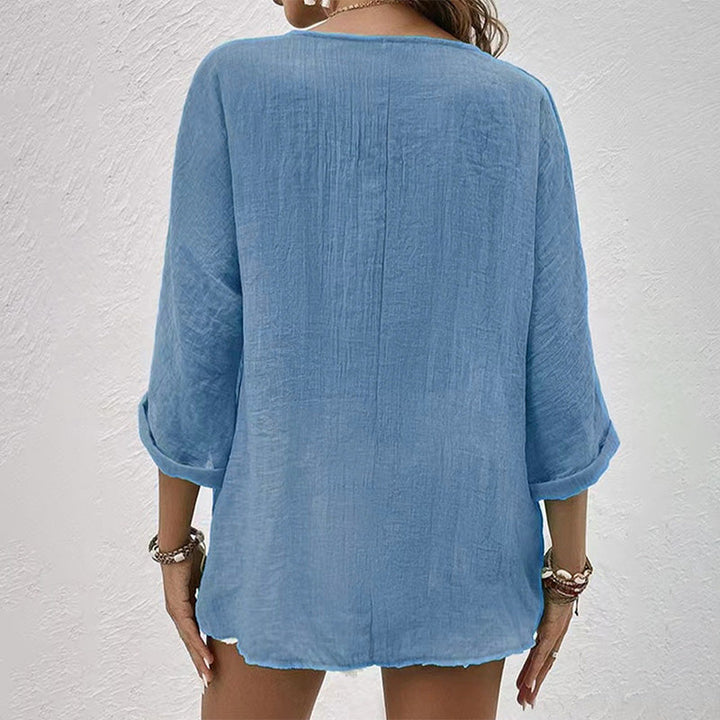 Blusa donna scollo a V, maniche lunghe. Camicia in cotone traspirante, comoda per diverse stagioni.