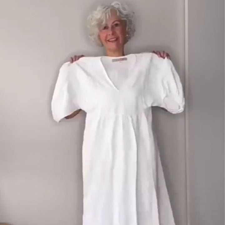 Abito estivo midi da donna con scollo a V, ideale per un look casual ma elegante, perfetto per ogni giorno.