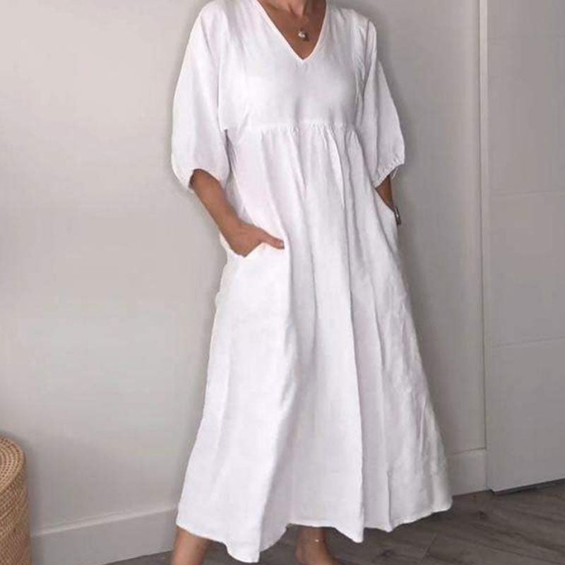 Vestito midi donna fluido con scollo a V, un capo confortevole e chic per il tuo stile estivo quotidiano.