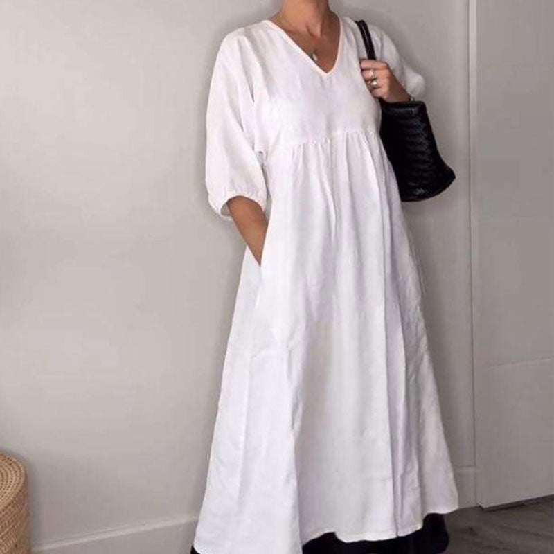 Abito midi da donna elegante con scollo a V, perfetto per look casual chic e confortevoli, ideale per l'estate.