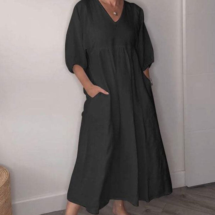 Abito midi da donna con scollo a V, un vestito casual chic estivo che unisce comfort ed eleganza.