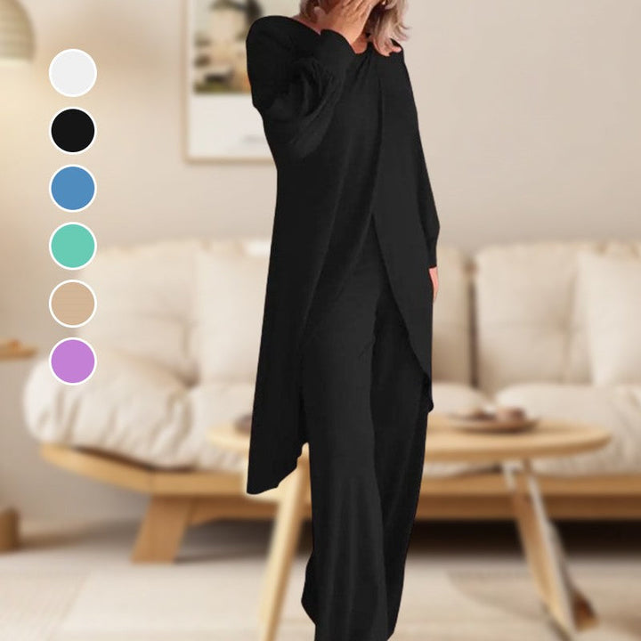 Completo donna due pezzi in tessuto morbido, con top e pantaloni, per un elegante casual look o abbigliamento relax.