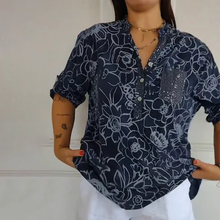 Top donna floreale primaverile con maniche lunghe e vestibilità ampia, un capo versatile ed elegante.