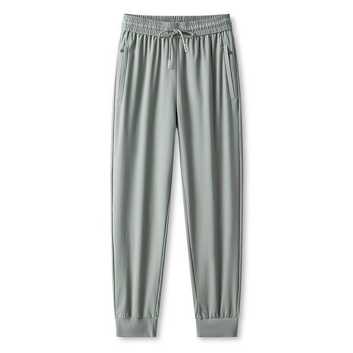 Pantaloni da jogging uomo neri, ideali per fitness, viaggio e relax. Tessuto traspirante e asciugatura rapida.