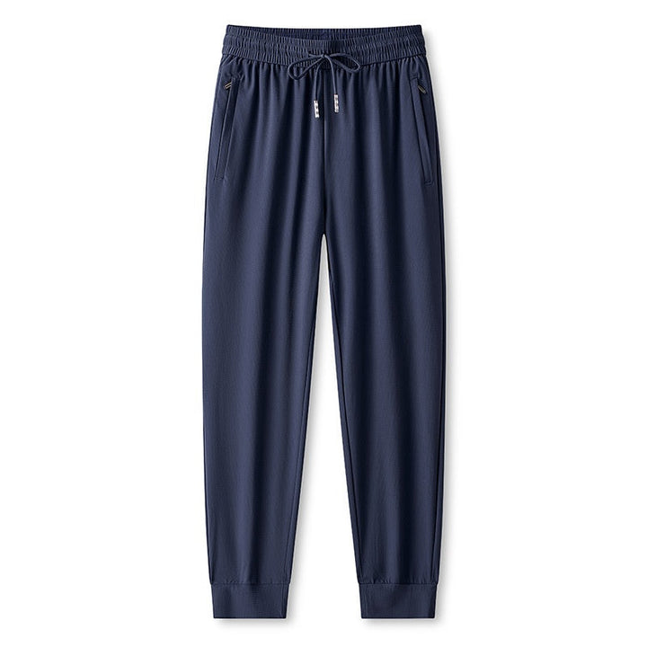 Pantaloni sportivi uomo per running e fitness. Comodi, traspiranti e ad asciugatura rapida, ideali per allenamenti intensi.