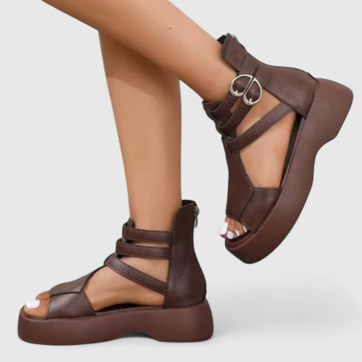 Sandali donna con supporto ortopedico avanzato per l'arco plantare, offrendo stabilità e comfort tutto il giorno.