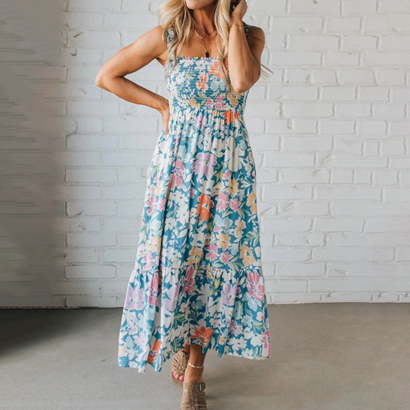Abito donna midi floreale con spalline sottili, svolazzante, perfetto per l'estate e feste in giardino.