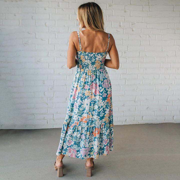 Vestito donna estivo midi con fantasia floreale, spalline sottili e linea svolazzante A-line, ideale per il giorno.
