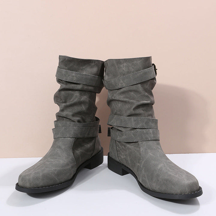 Stivaletti neri donna autunnali con fibbia. Design moderno, tacco basso e suola antiscivolo per sicurezza.