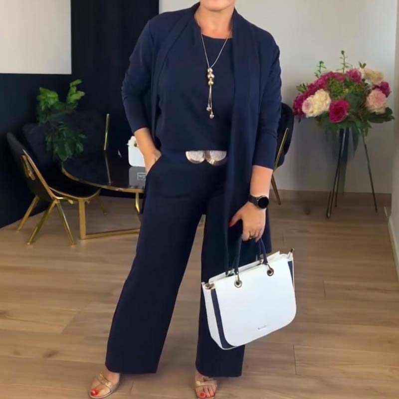 Set coordinato donna tre pezzi, ideale per un look elegante con cardigan lungo e pantaloni larghi.