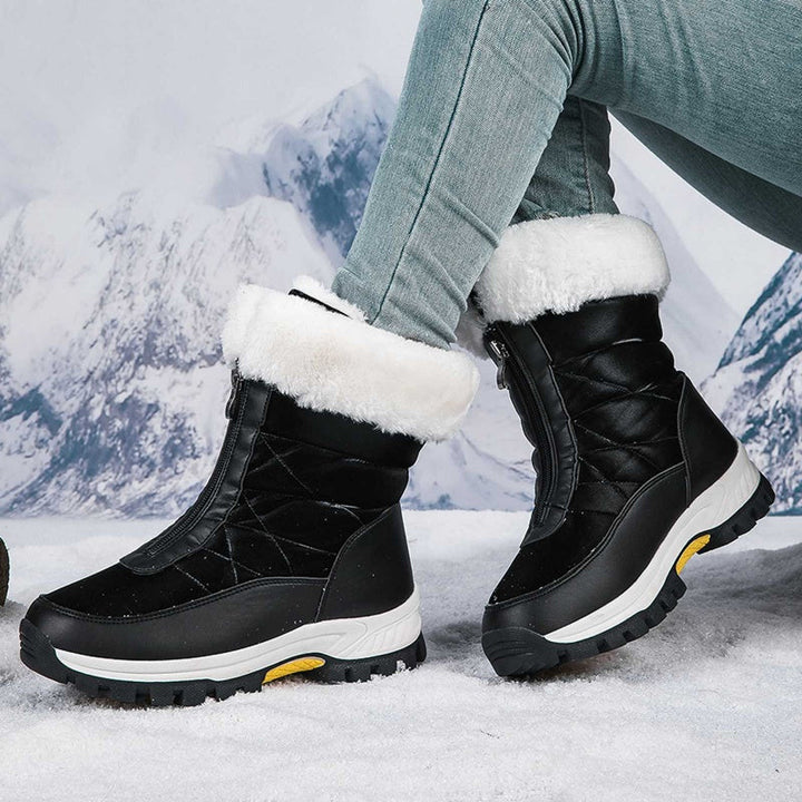 Stivali da neve da donna con pratica zip. Caldi, robusti e con suola antiscivolo per l'inverno.