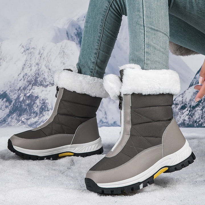 Stivali da neve donna, con chiusura zip. Caldi e comodi, garantiscono sicurezza su ghiaccio e neve.