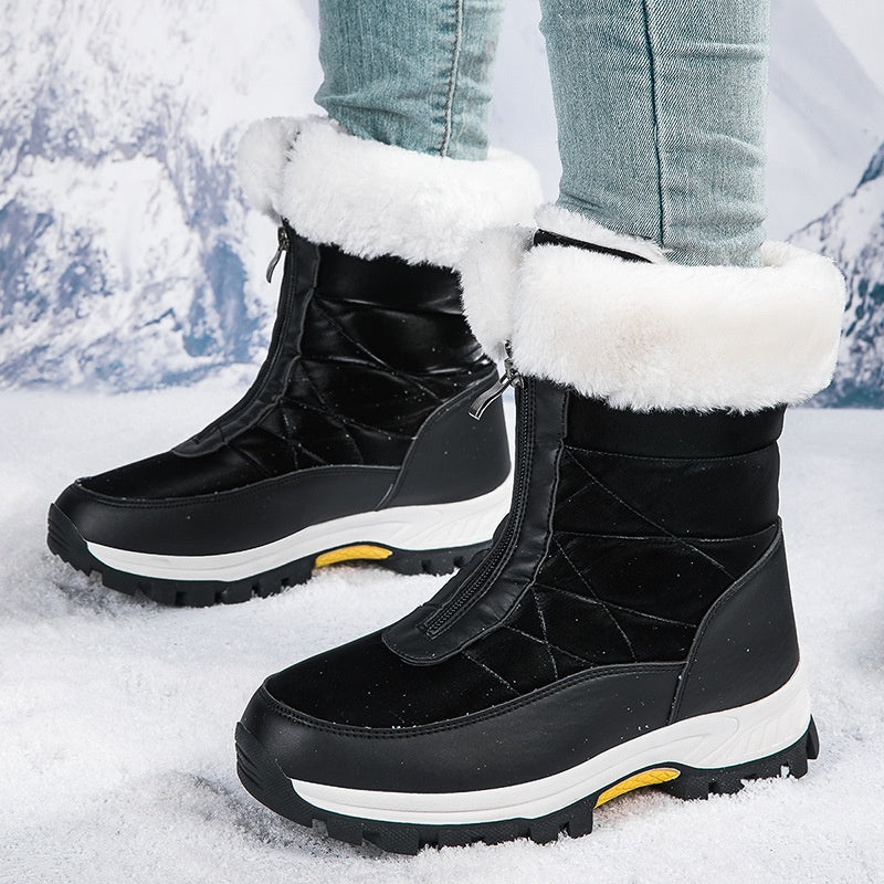 Stivali invernali da donna con zip, ideali per la neve. Suola antiscivolo per sicurezza e comfort.