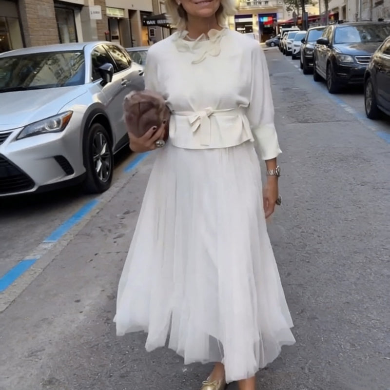 Abito lungo plissettato e maglia coordinata, completo donna due pezzi perfetto per un look elegante.