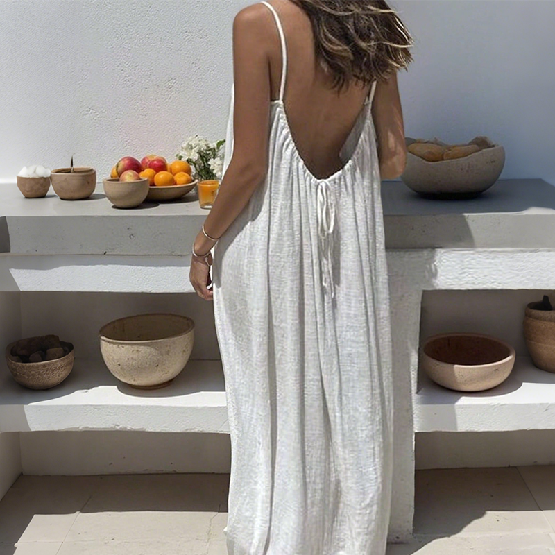 Abito estivo maxi da donna, leggero e confortevole, con spalline sottili e design a schiena scoperta, ideale per il caldo.