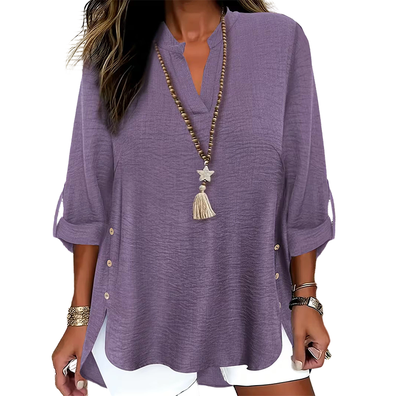 Top donna estivo con scollo a V e bottoni decorativi, per un outfit versatile e leggero.