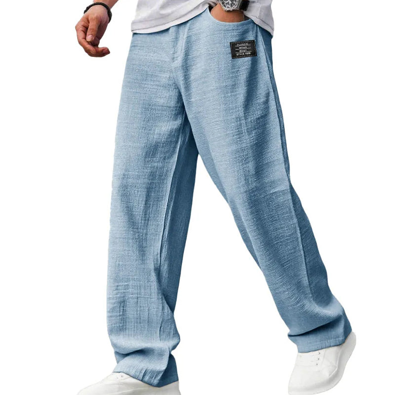 Pantaloni uomo a gamba dritta per viaggio e tempo libero, look casual e confortevole con tasche ampie.