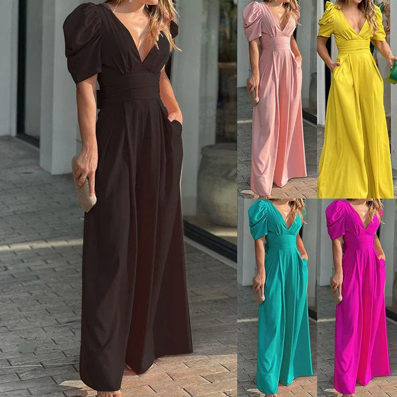 Tuta elegante donna con scollo a V, pantaloni palazzo a gamba larga, tessuto leggero per la bella stagione.