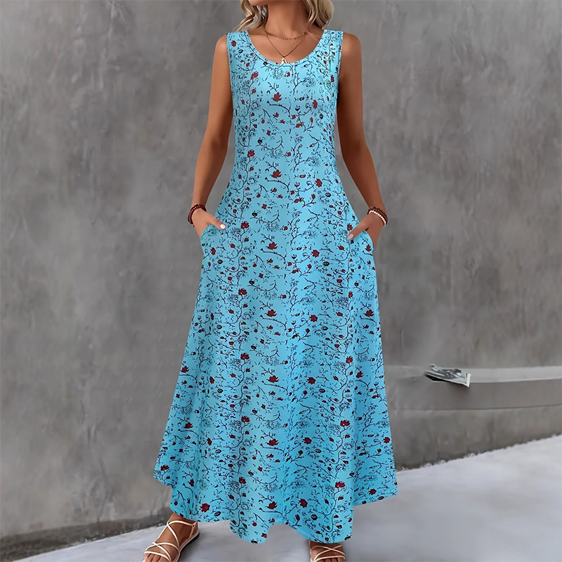 Abito estivo da donna con stampa floreale e tasche, design lungo e casual per il tuo guardaroba estivo.