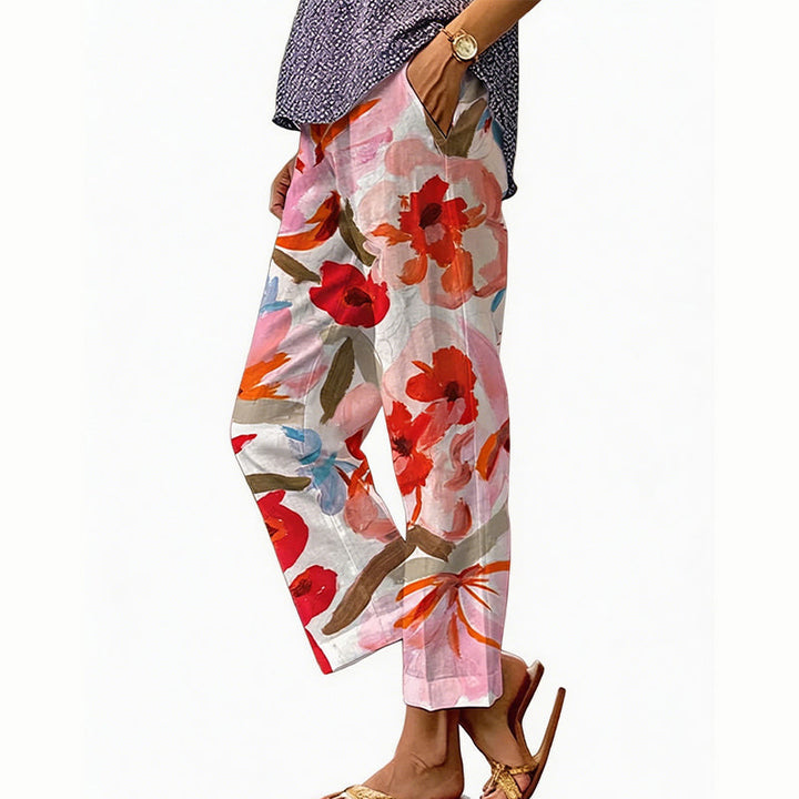 Eleganti pantaloni estivi da donna, stampa floreale colorata, vita regolabile per una vestibilità perfetta.