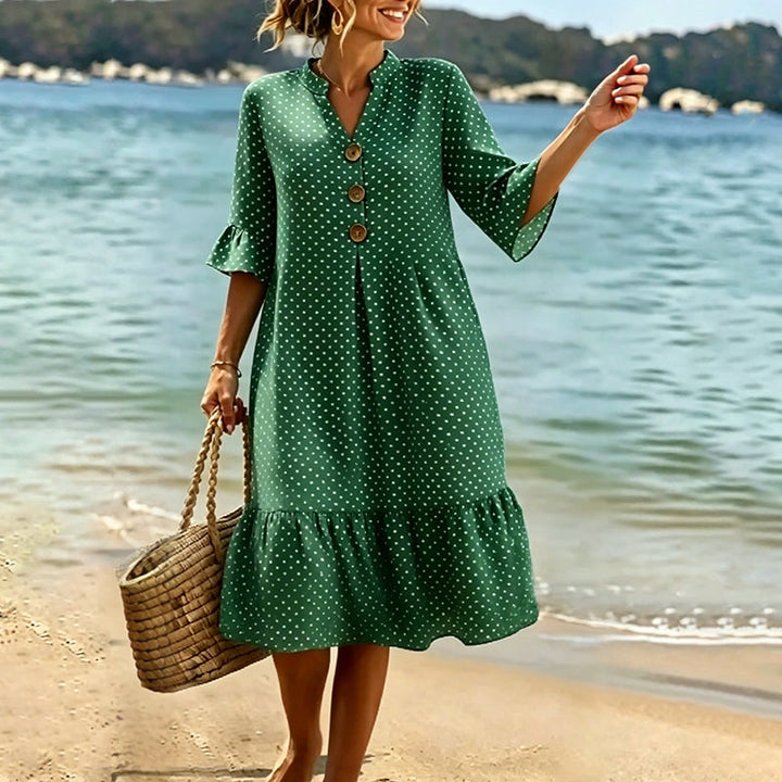 Abito midi fluido in cotone per donna, stampa a pois e dettagli volant, comfort estivo.