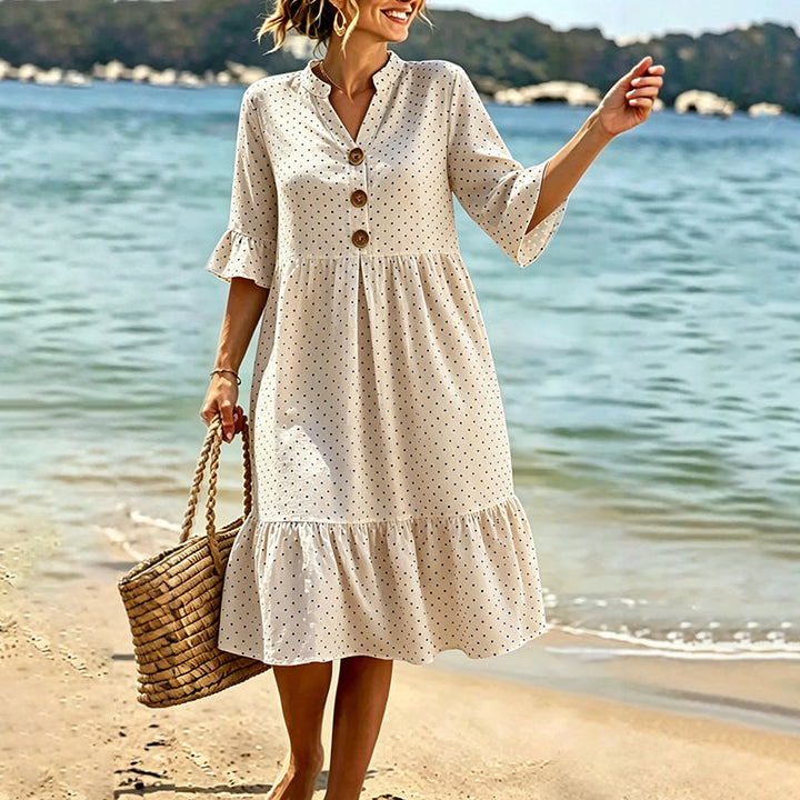 Abito in cotone donna a pois, lunghezza midi, con volant, ideale per look estivi chic.