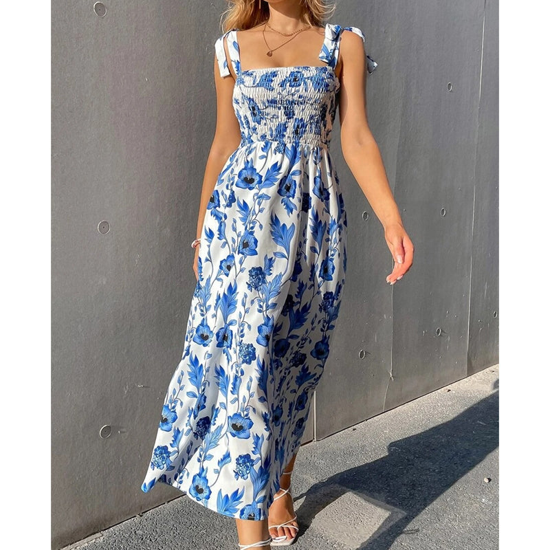Abito lungo donna floreale, versatile e leggero, con spalline regolabili. Ideale per giornate di sole e serate.