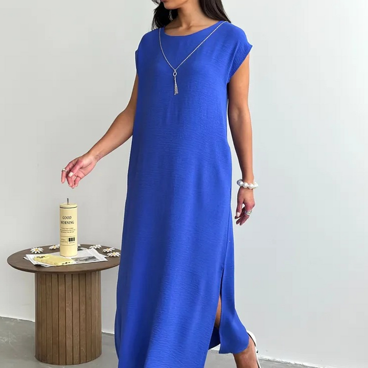 Confortevole abito midi donna primavera estate, in micro-crepe con girocollo e spacco laterale, per moda femminile.