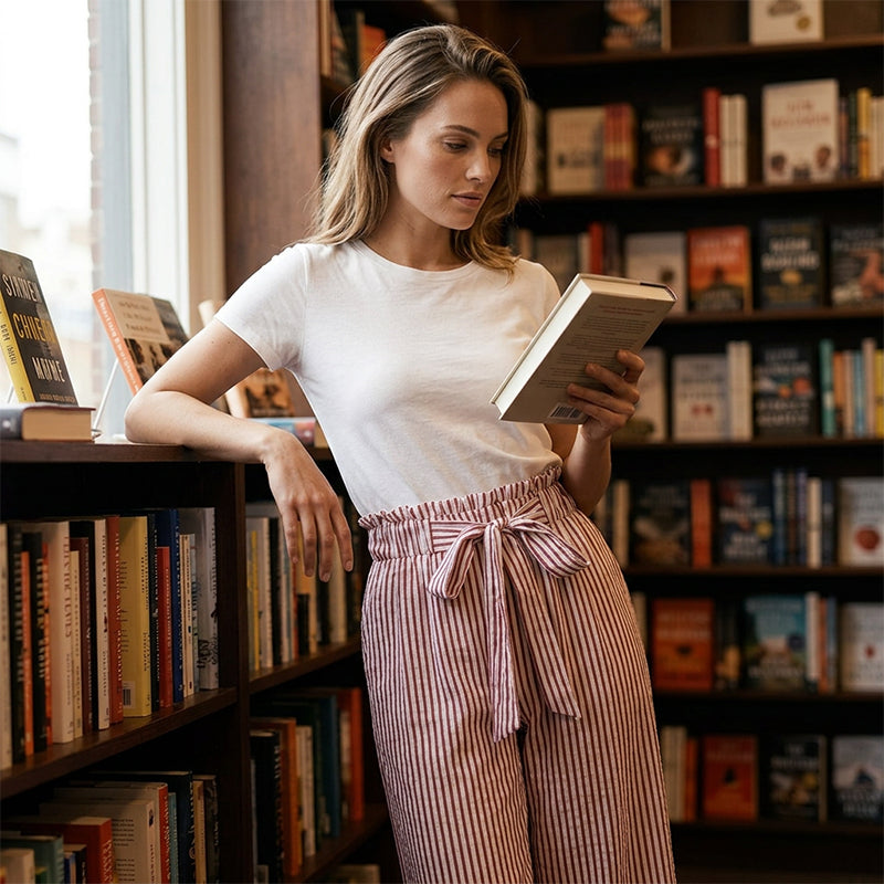 Pantaloni da donna primaverili/estivi a gamba larga, vita paperbag, per un look casual-elegante.