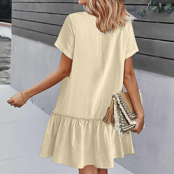 Abito donna in lino cotone, estivo, corto, fresco, con bottoni e silhouette elegante.