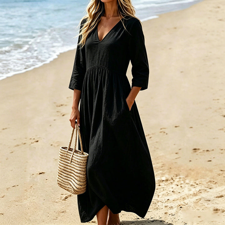 Abito lungo donna, estivo e casual, con scollo a V, ideale per vacanza, mare e uno stile primaverile alla moda.