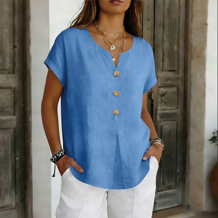 Maglietta casual donna, scollo a V e bottoni decorativi. T-shirt a manica corta comoda per look quotidiani estivi.